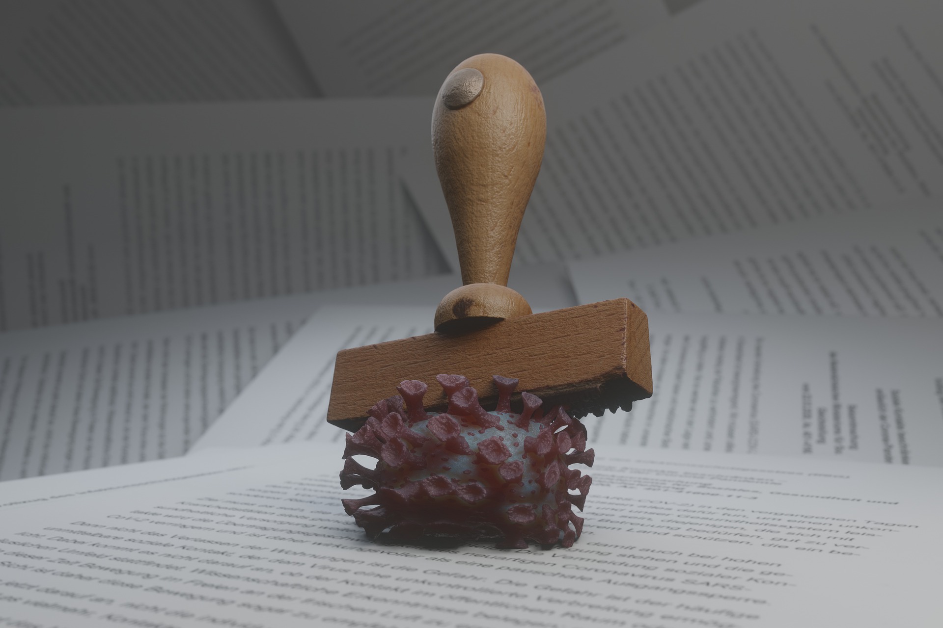 Stempel zerdrückt Coronavirus auf Papier